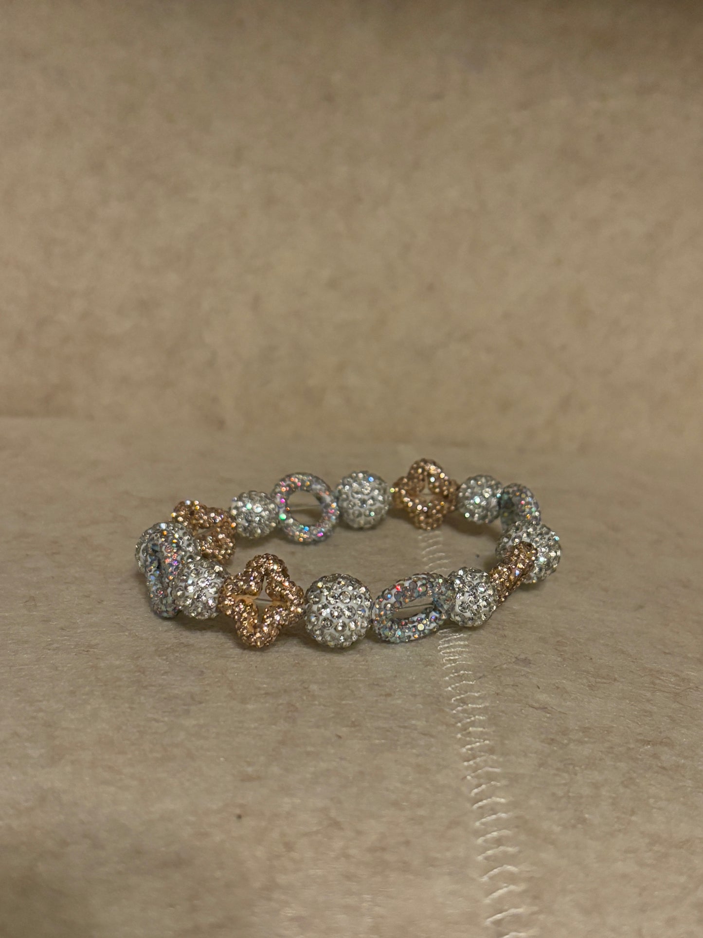 silver and rose gold bracelet