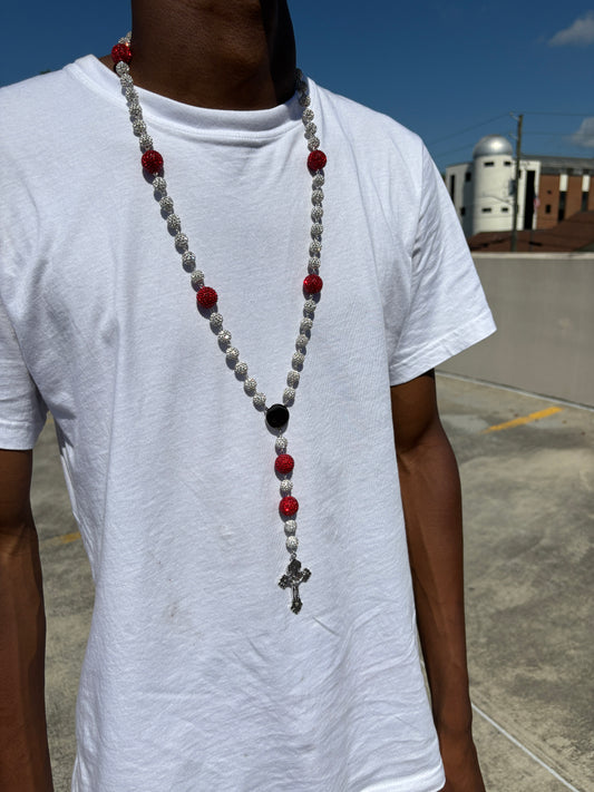 silver and red rosary