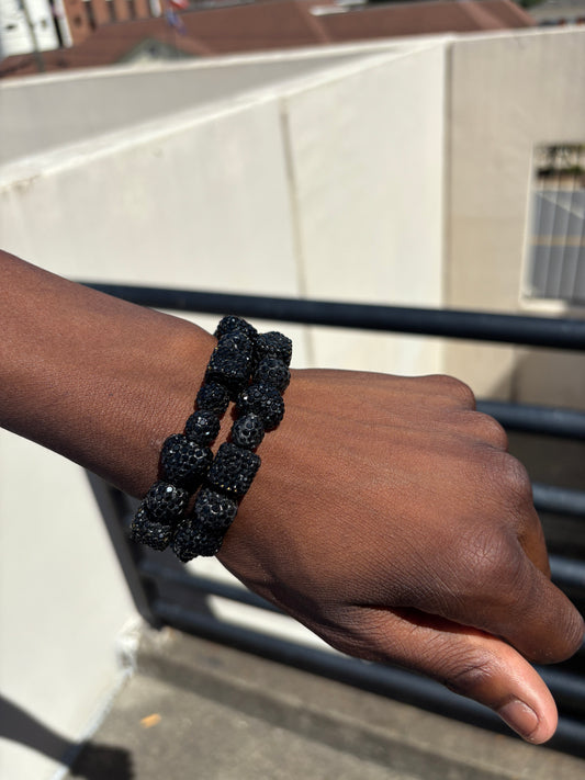 2 black braceletn
