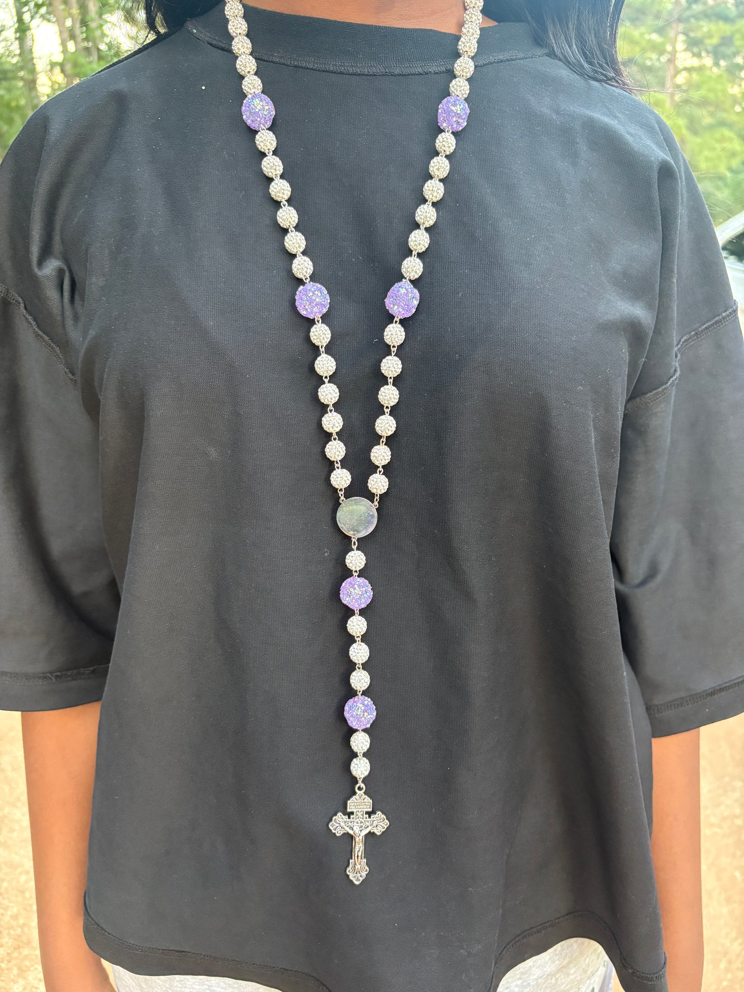 silver and purple rosary